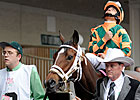 Champion Proud Spell Upset in Comeback